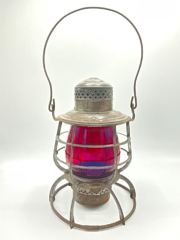 Central New England Railroad Lantern Red Cast Globe: Central New England Railroad Lantern Red Cast Globe. Made by Armspear. Dimensions: 10 1/2” x 7” With handle: 16” x 7”
