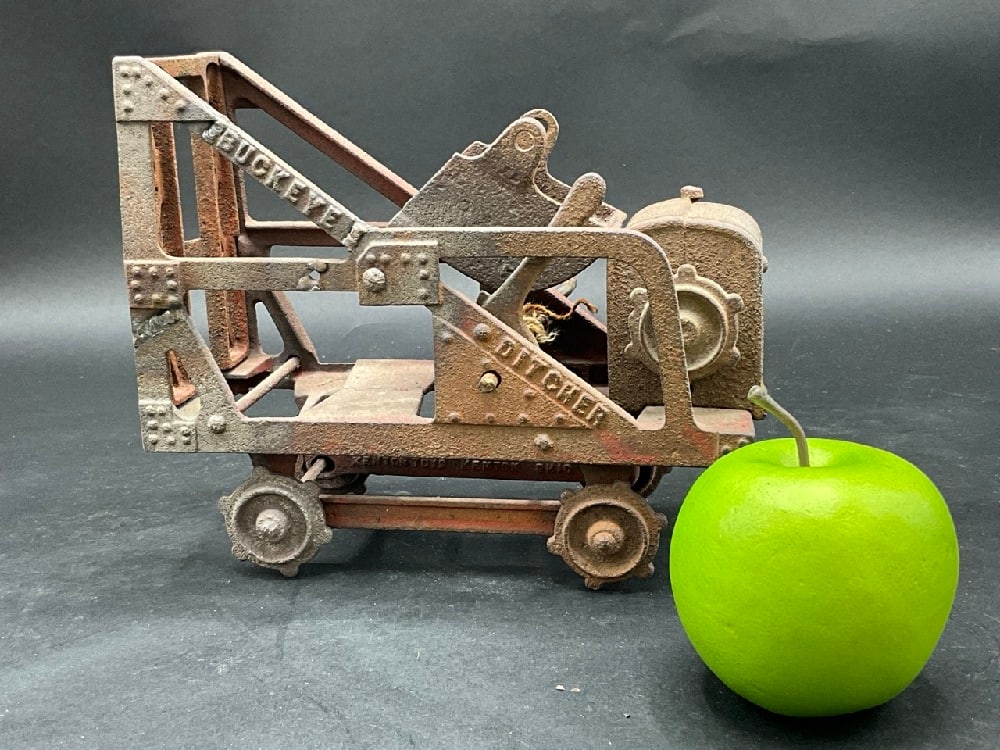 Kenton Buckeye Ditcher Cast Iron Toy: Kenton Buckeye Ditcher Cast Iron Toy. Dimensions: 6 1/2” x 7 1/2” x 3 1/4”
