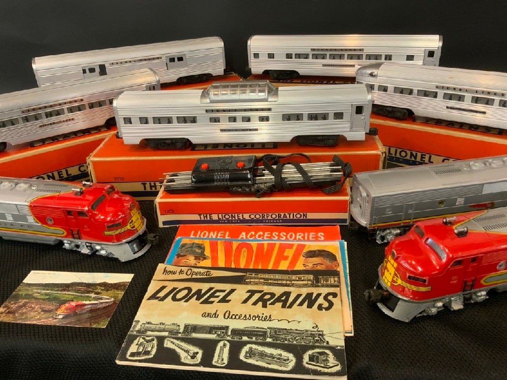 Lionel Train Nine Piece Train Lot with Manuals: Lionel Train Nine Piece Train Lot Including: No. 2532, No. 2533, No. 2531, No.2534, No. 2530, No. 2353T, “O” Gauge Remote Control Track Set, No. 2353 P, Santa Fe Good Condition, Please See
