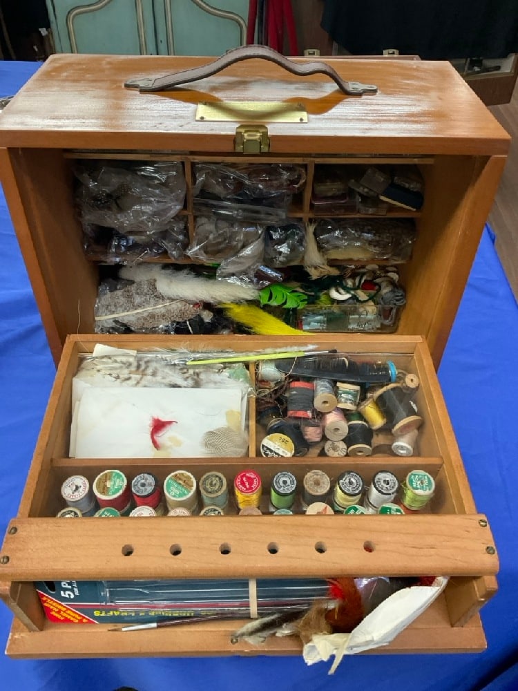 Quality Fly Fishing Box with Contents: Quality Fly Fishing Box with Contents. Fly tying tools, rooster tails, supplies as seen in photograph preview. Dimensions: 14” x 18” x 9”