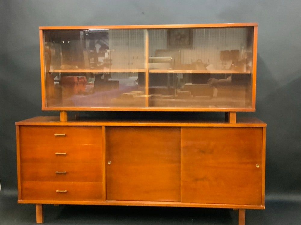 James Philip Co. MCM Teakwood Breakfront Cabinet: James Philip Co. MCM Teakwood Breakfront Cabinet. MCM Teakwood Two Piece Entertainment Crendeza Partial Label James-Philip Co. Inc. Patterson, NJDimensions: 57”H x 70”W x 18” DOveral