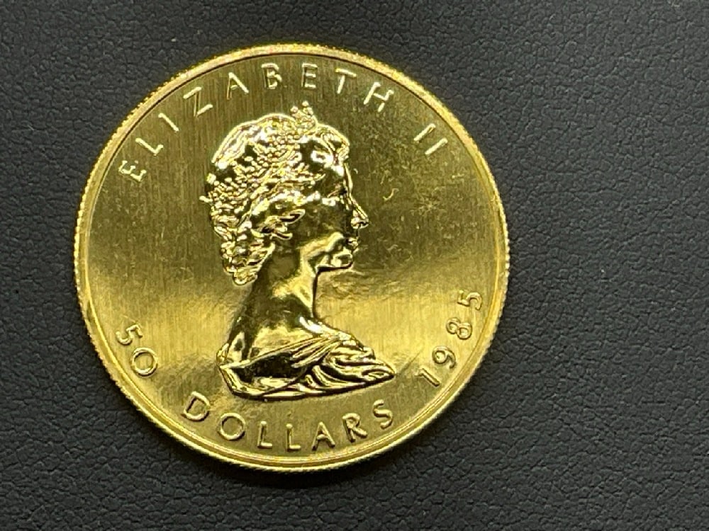 1985 .999 Pure Gold 1 Troy Ounces Maple Leaf Coin (1 of 4)