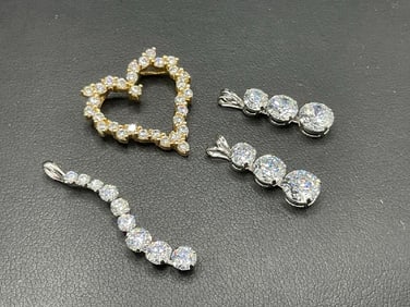 Four (4) 14K Gold Pendants