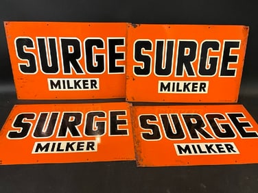 Four (4) Surge Milker Orange Signs