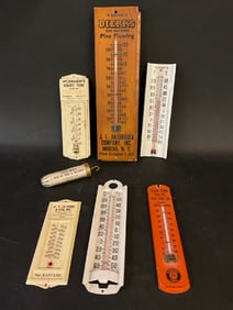 Seven (7) Advertising Thermometers