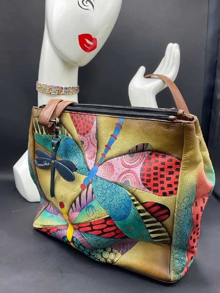 Anna by Annuschka "Dragonfly" Hand Painted Leather Handbag: Anna by Annuschka "Dragonfly" Hand Painted Leather Handbag. Dimensions: 12” x 14” and 18” adjustable strap drop