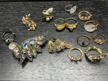 Thirteen (13) Swarovski Rings