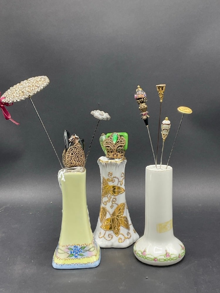 Compiled Hat Pins and Porcelain Holders: Compiled Hat Pins and Porcelain Holders. As seen in photograph preview.