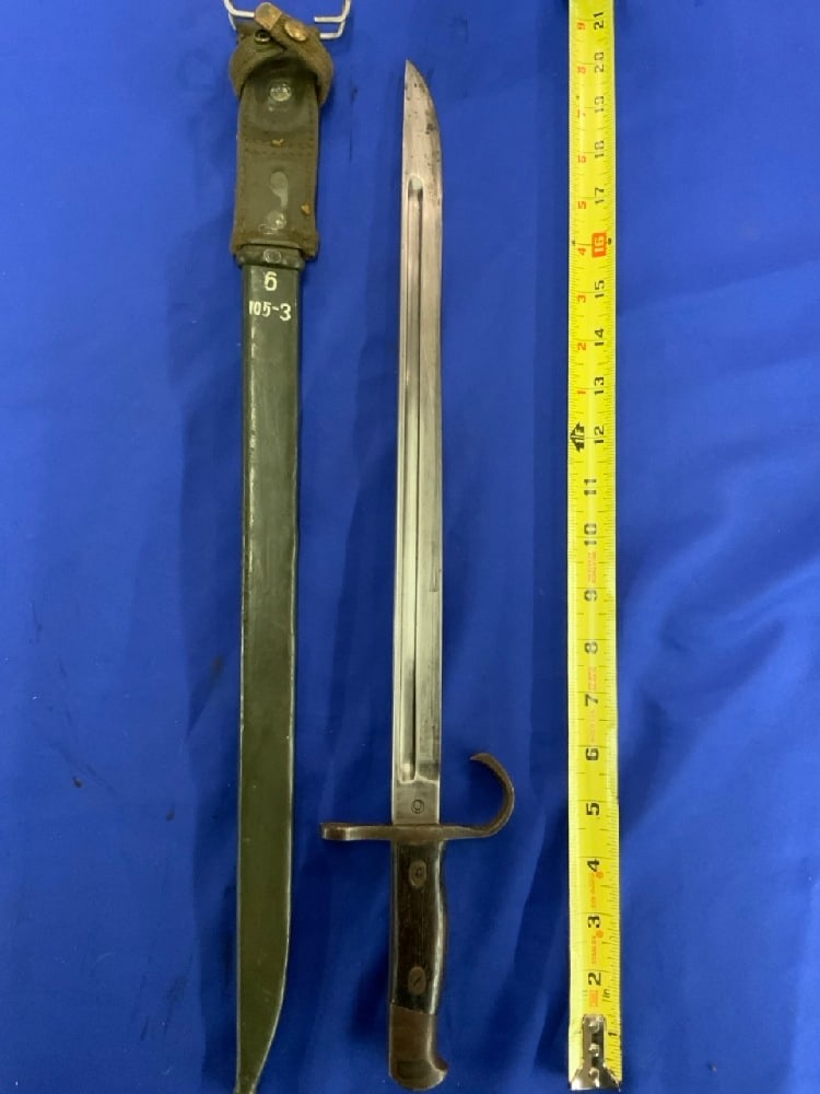 WWII Japanese Arasaka Bayonet With Sheath: WWII Japanese Arasaka Bayonet With Sheath Korean War Reissued.Dimensions: 20.5”