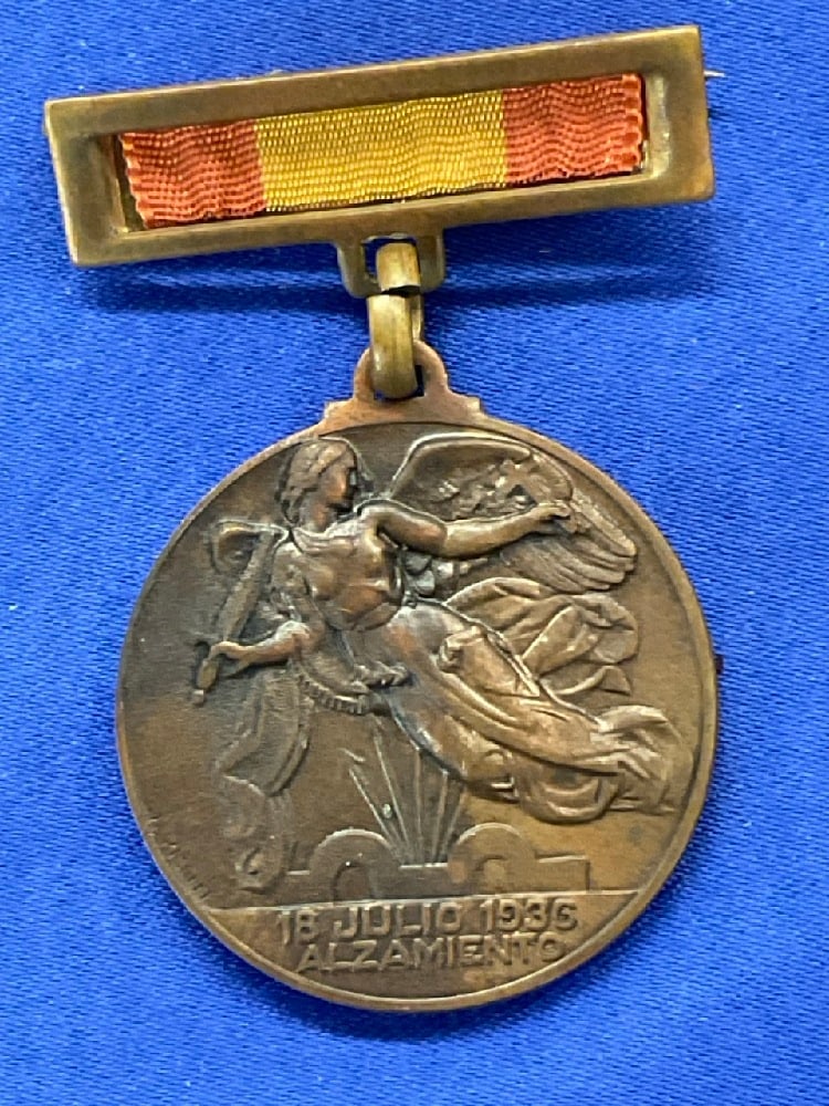 Spanish Civil Was Medal “The Uprising and Victory": Spanish Civil Was Medal (4) Russian, Hungarian and Polish AK47 Unissued Bayonets “The Uprising and Victory".Dimensions: 1 1/4” d