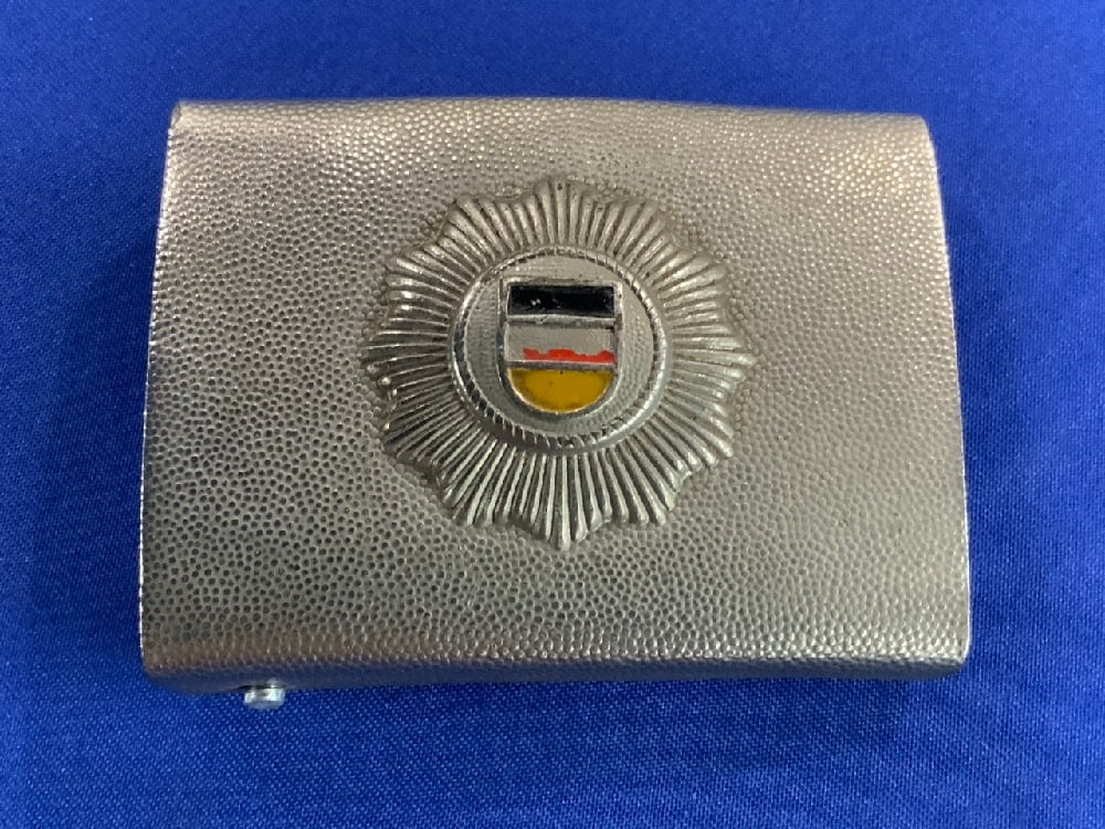 German People’s Police Belt Buckle: German People’s Police Belt BuckleDimensions: 2” x 2 1/2”