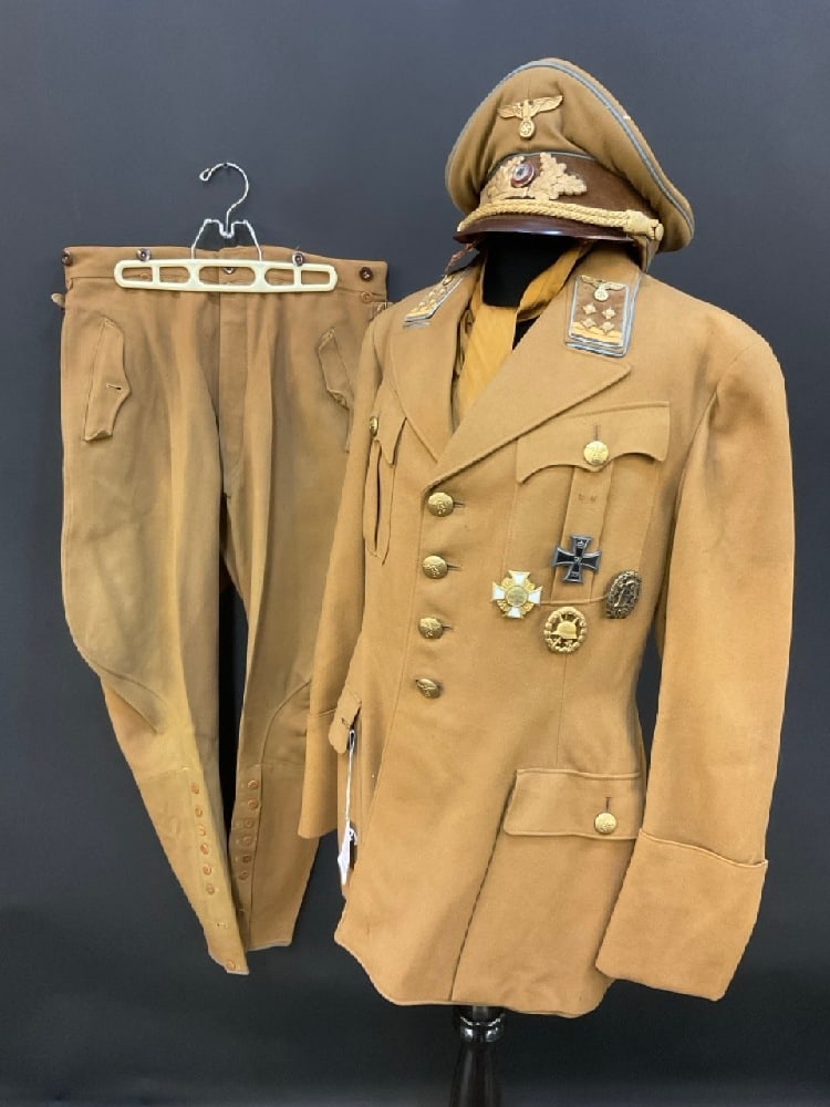 NSDAP Political Leader Uniform German WWII Gemeinschaftsleiter: NSDAP Political Leader Uniform German WWII Gemeinschaftsleiter. 3rd Reich. Damaged Visor Cap. Includes Medals, Cap, Pants and Jacket. Size 52 Jacket.