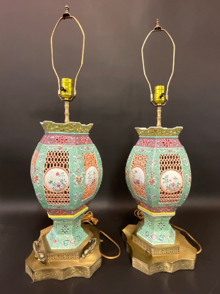 Early 20th Century Chinese Famille Rose Porcelain Articulated Table Lamps: Early 20th Century Chinese Famille Rose Porcelain Articulated Table LampsDimensions: 22” H- 30” H to Finial 9” WideDragons are Missing on one lamp base.