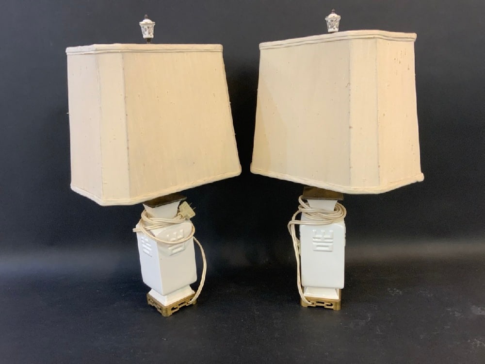 Pair Of Chinese Table Lamps: Dimensions with lampshades 23.5” x 10.5” x 7”Dimensions without lampshades 23.5” x 3.5 x 3.5” Inside of lampshades are ripped please see photograph preview