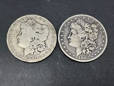 (2) New Orleans U.S. Morgan Silver Dollars