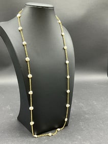 Classy 18k Yellow Gold and Pearl 28" Strand Necklace