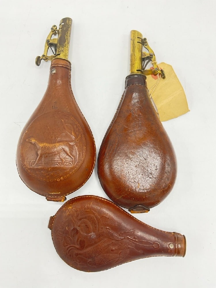 Three (3) Antique English Hunting Leather & Brass Powder Flasks: Three (3) Antique English Hunting Leather & Brass Powder Flasks.Dimensions: 8 1/2” x 3 1/2”