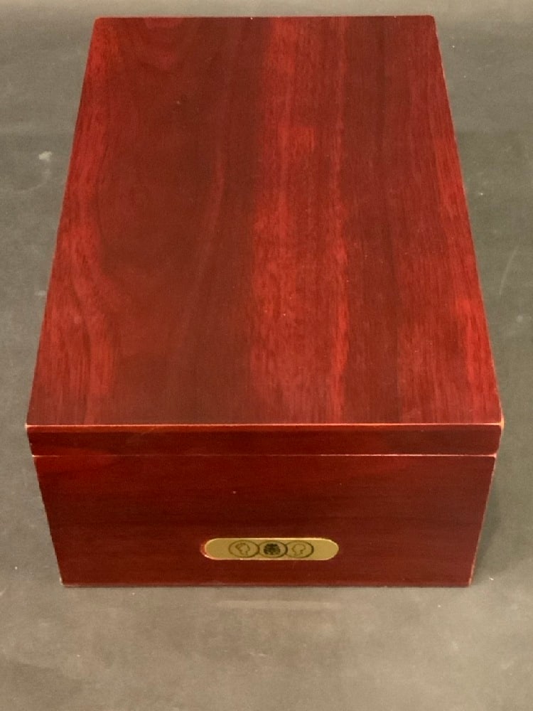 American Mint Pioneers Gold Replica Gold Plated Coin Set Wooden Display Box: American Mint Pioneers Gold Replica Gold Plated Coin Set Wooden Display Box. Includes five coins. Dimensions: 11”x7”x4”