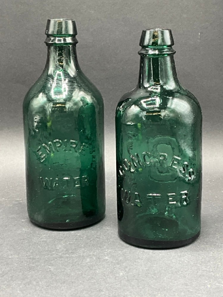 Two (2) Green Glass Antique Saratoga, NY Water Bottles: Two (2) Green Glass Antique Saratoga, NY Water Bottles.Congress and Empire Dimensions: 7 1/2” x 3” Saratoga NY