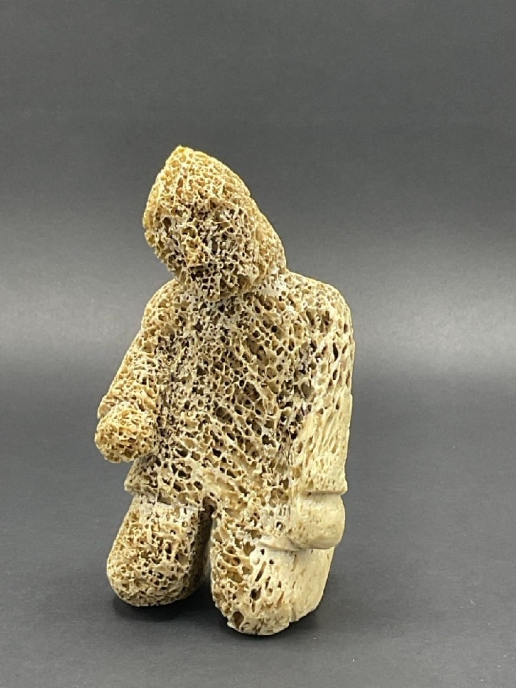 Vintage Alaskan Inuit Bone Carving of Eskimo: Vintage Alaskan Inuit Bone Carving of Eskimo.Dimensions: 5 1/2” x 3 1/2” x 2 1/2”