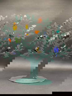 Swarovski Crystal Twelve (12) Birds of Paradise w/ Sterling Silver: Swarovski Crystal Twelve (12) Birds of Paradise w/ Sterling Silver. Signed for Daniel Swarovski. Dimensions: 18” x 19” x 1" (stand) and 2" to 3" birds.