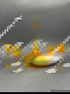 A Fine Louis Comfort Tiffany Favrile Glass Liquor Decanter Set: A Fine Louis Comfort Tiffany Favrile Glass Liquor Decanter Set. A fine American gold iridescent and acid etched art glass liquor decanter bottle with four (4) cordial glasses. All matching. Decanter s