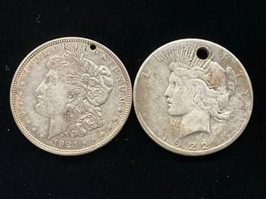 Lot of 2 Holed US Silver Dollars