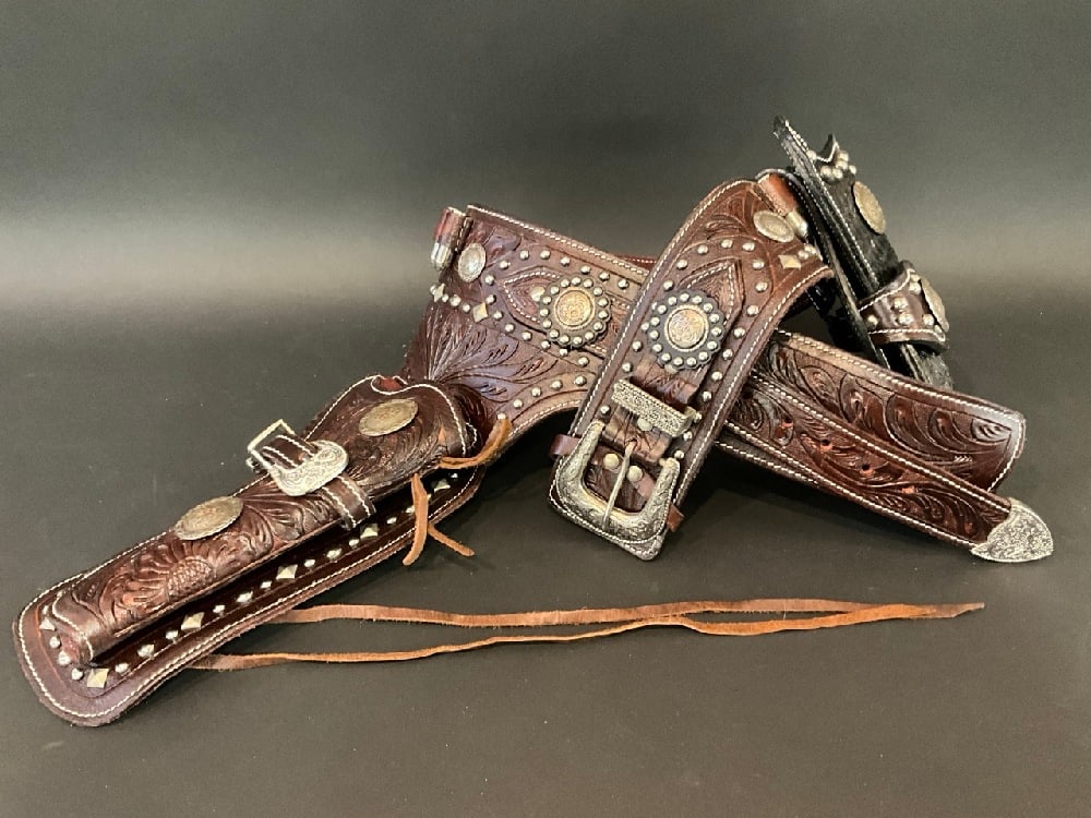Vintage Artisan Tooled Leather Gun Holster: Vintage Artisan Tooled Leather Gun Holster. Purchased in Texas from Mexican artist. Artist unknown. Dimensions: 42” x 3” w/ holster - 42” x 16”