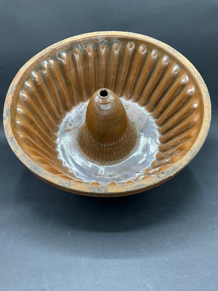 Large Primitive Glazed Redware Bundt Pan: Large Primitive Glazed Redware Bundt Pan.Dimensions: 5 3/4” x 14 1/2”