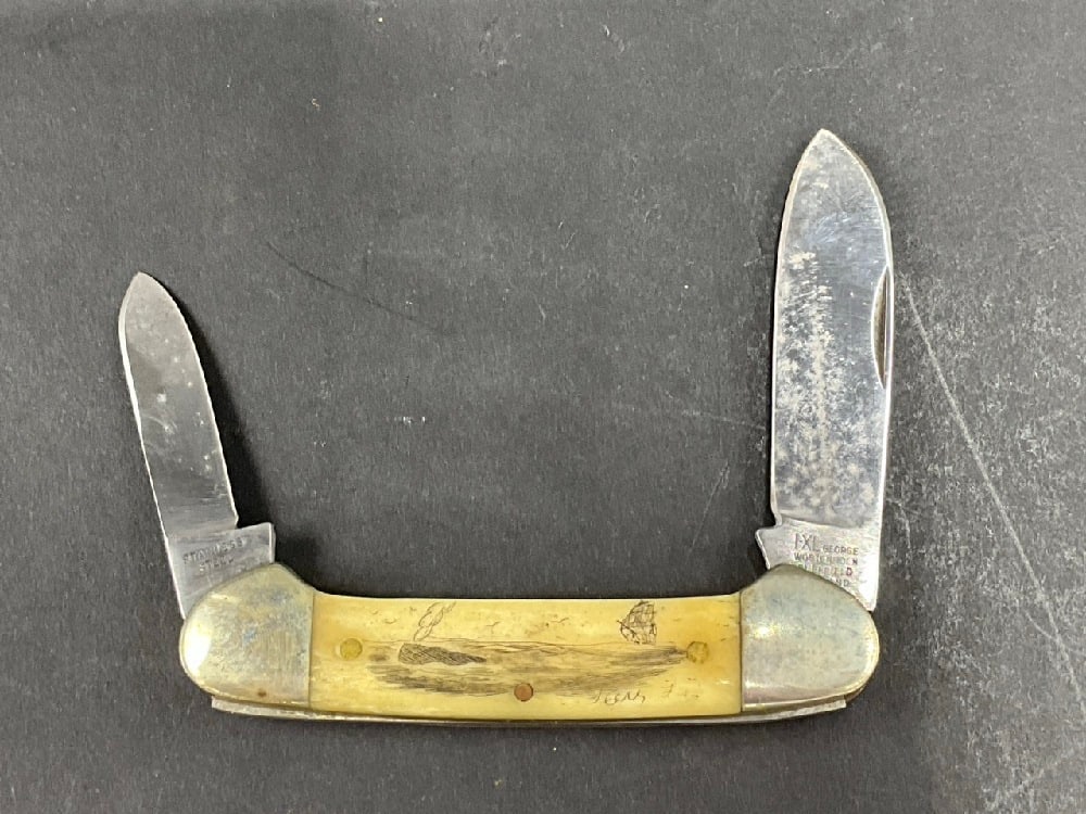George Wostenholm IXL Sheffield, England Bone Scrimshaw: George Wostenholm IXL Sheffield, England Bone Scrimshaw - double blade folding knife. Dimensions: 6 1/4”