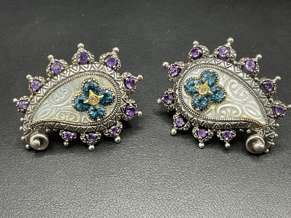 Barbara Bixby 18K/925 Pierced Gemstone Paisley Earrings: Barbara Bixby 18K/925 Pierced Gemstone Paisley Earrings. Amethyst, Blue Topaz, Diamond and MOP Paisley Earrings.Dimensions: 1 1/4” x 1” 21.2 grams