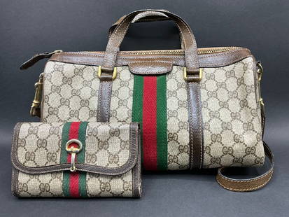 Vintage Gucci Bag & Wallet: Vintage Gucci Bag & Wallet. Condition: slight wear to the exterior bottom leather lining. Several pen marks and light brown/yellow spots on the interior. Dimensions: Purse - 7&rdquo; x 13&rdquo; x 4 1
