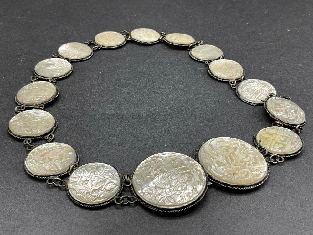 19th Century Chinese Carved Mother of Pearl and Silver Belt: 19th Century Chinese Carved Mother of Pearl and Silver Belt. Very fine mother-of-pearl medallions with scenic carvings with Chinese people and village life. Signed with initials and chop marks. Dimens