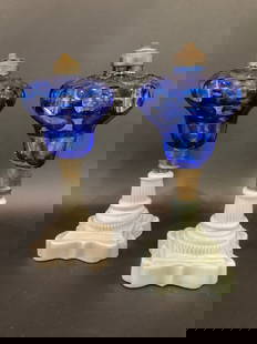 (2) Antique Cobalt Blue Cut to Clear & Milk Glass Oil Lamps: (2) Antique Cobalt Blue Cut to Clear & Milk Glass Oil Lamps.No shades or burners included. Dimensions: 10 1/2” x 4 1/4”