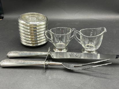 Compiled Grouping of Weighted Sterling Silver Tablewares: Compiled Grouping of Weighted Sterling Silver Tablewares. Sugar and creamer, coasters and carving set. As seen in photograph preview.