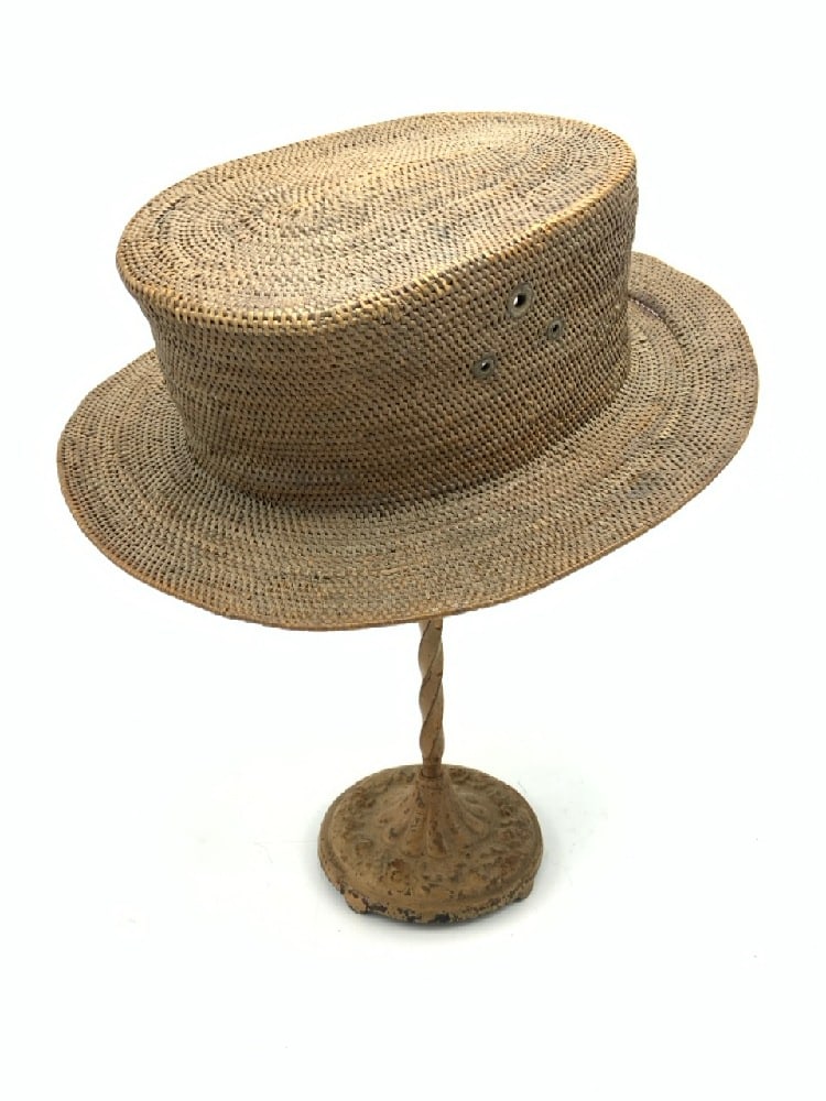 Nias Cane Hat: Nias Cane Hat.Dimensions: 6” d Condition - Separated on the brim of the hat.