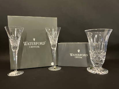 Waterford Crystal “Lismore?? Flutes and Vase: Waterford Crystal “Lismore” Flutes and VaseIn Original BoxesGood Condition, Please See Preview Photographs