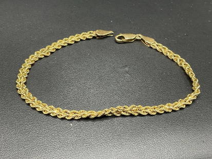14K Yellow Gold Rope Chain Bracelet: 14K Yellow Gold Rope Chain Bracelet. Dimensions: 7 14" Total weight: 4.68 grams.