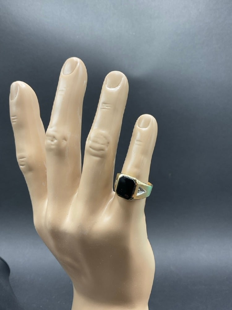 10K Yellow Gold Onyx and Diamond Ring: 10K Yellow Gold Onyx and Diamond Ring.Size 10 Total weight: 4.10 grams.
