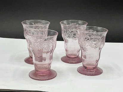 Four (4) Depression Glass Amethyst Juice Glasses: Four (4) Elegant Central Glass Works Footed Tumbler Juice Glasses. Amethyst Color. One having slight nip and one glass appears shaved down from others. Please see photograph preview.Dimensions: 3 1/4&