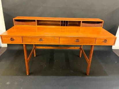 Peter Lovig Nielsen Danish Modern  Teakwood Flip Top Desk: Peter Lovig Nielsen Danish Modern Teakwood Flip Top Desk.All original with protective glass tops. Very good condition. A small wood split stress located on back right leg. Estate find. One owner. Dime