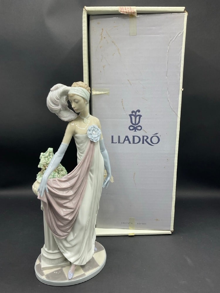 Lladro “Socialite of the 20s?? Hand-painted Porcelain Figure: Lladro “Socialite of the 20s” Hand-painted Porcelain Figure. Box Included. Dimensions: 13” x 5” x 4”