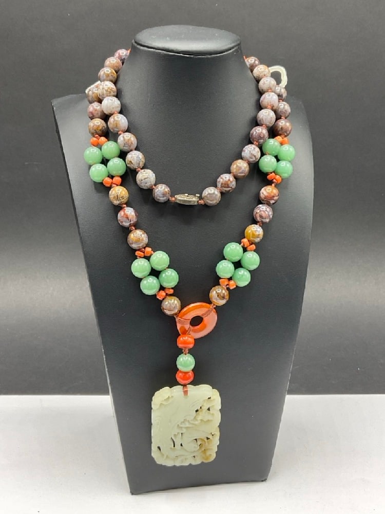 Carved Jade Necklace: Carved Jade Necklace. Chinese silver clasp. Dimensions: 30” length and 25” drop