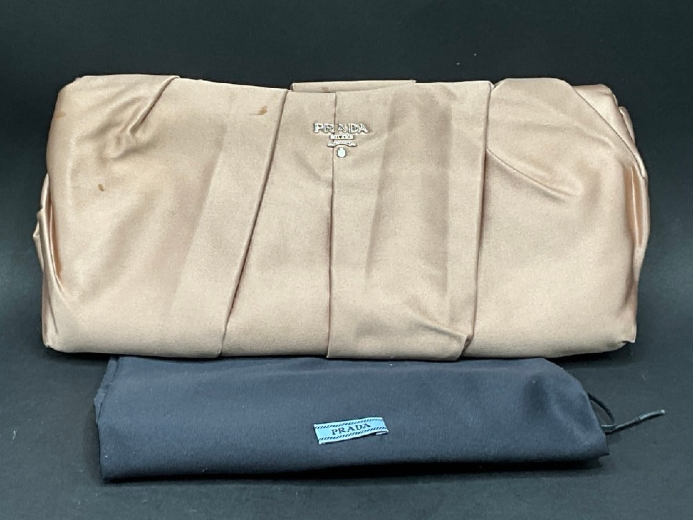 Satin Prada Clutch: Satin Prada Clutch Good Condition, Please See Photograph Preview( some staining)Dimensions:12” L x 6” H 1” W