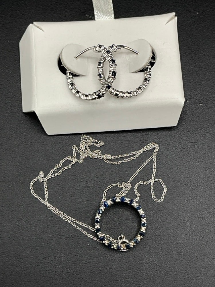 10K White Gold Sapphire Pendant Necklace and Hoop Earrings: 10K White Gold Sapphire Pendant Necklace and Hoop Earrings. Total weight: 5 grams.