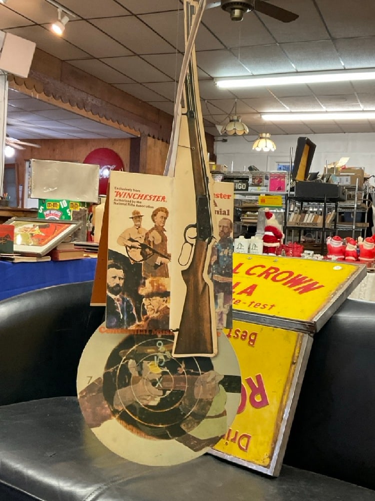 Winchester NRA Vintage Advertising Hanging Mobile Sign: Winchester NRA Vintage Advertising Hanging Mobile Sign. Some creases and wear. Plesae see photograph preview. Dimensions: 29” x 10”