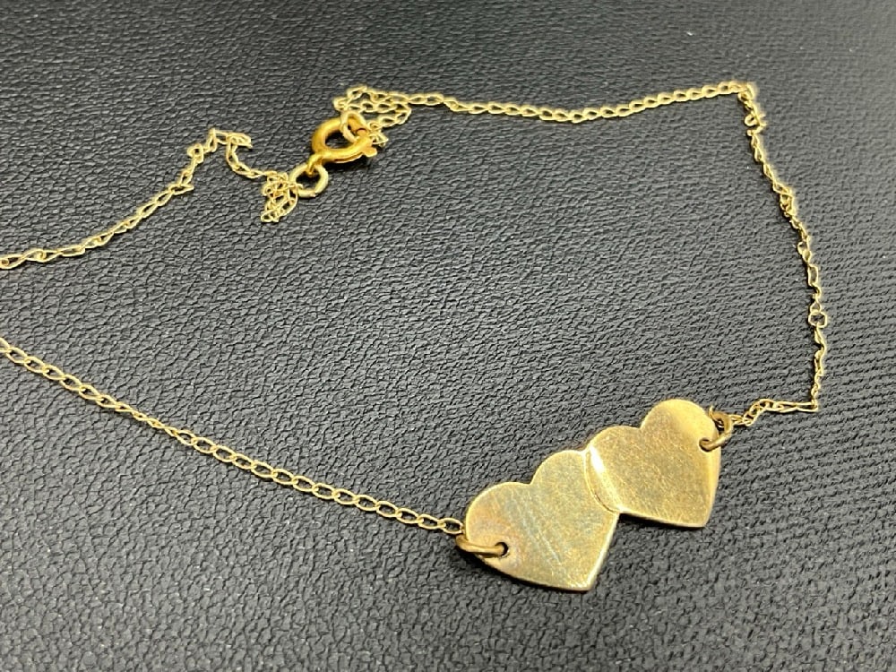 14K Yellow Gold Dainty Double Heart Anklet: 14K Yellow Gold Dainty Double Heart Anklet.Dimensions: 9” Total weight: <1 gram.