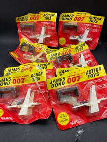 Eight (8) 1960’s Gilbert James Bond 007 Action Playsets