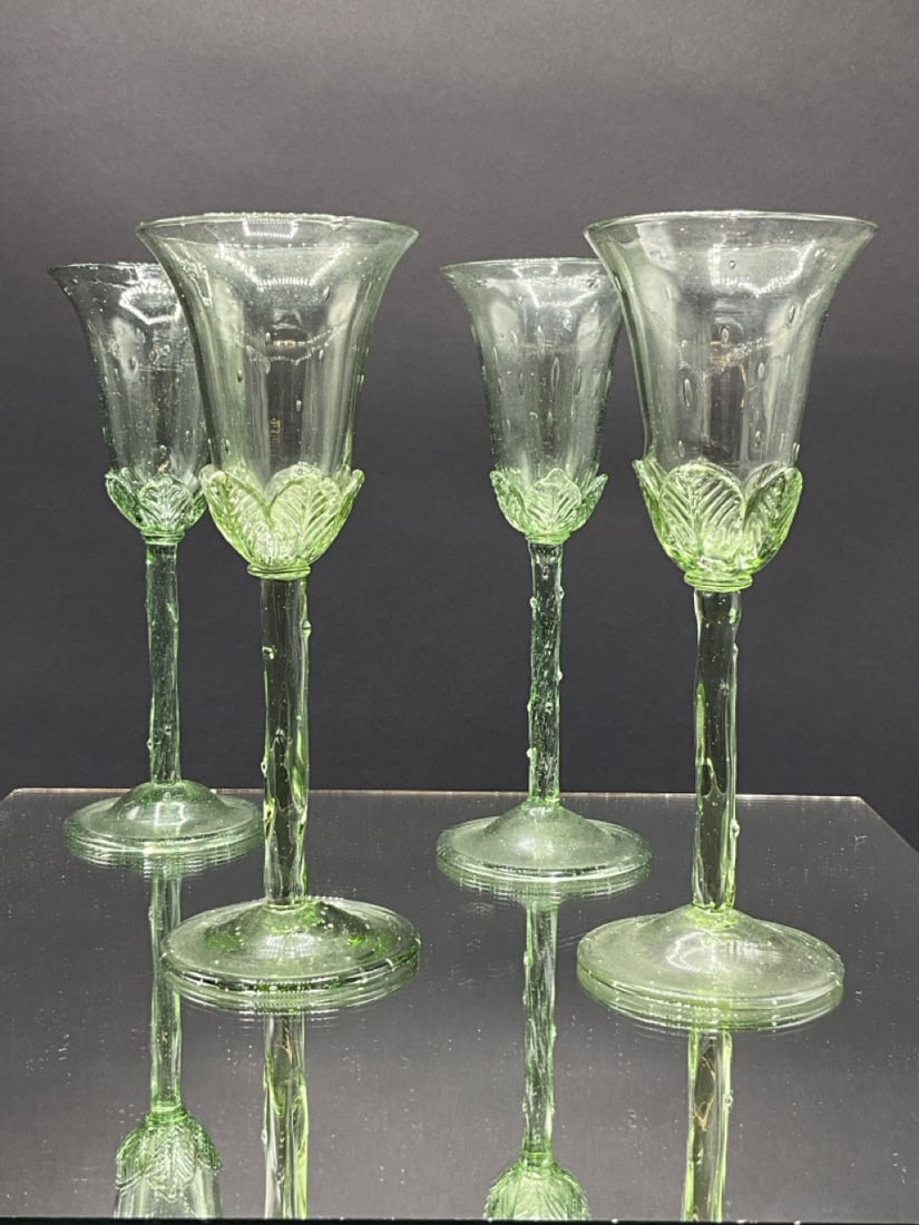 Very Rare Steuben Set of 4 Spanish Green Cordial Glasses with Leafage: Very Rare Steuben Set of 4 Spanish Green Cordial Glasses with Leafage.A fine set of four Steuben Spanish Green 8316 cordial dessert wine set. A pale green color with stiff leafage around the bottom se