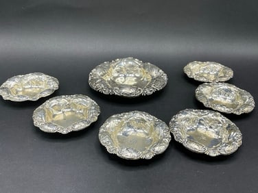 Seven (7) Whiting Hibiscus Repousse Sterling Bowls